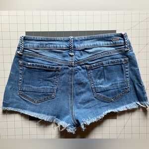 Distressed denim shorts